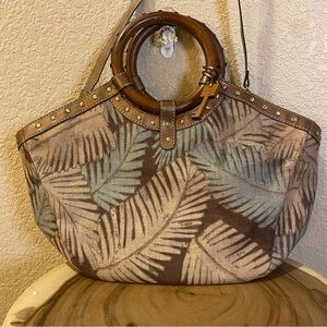 Fossil handbag dark Hawaiian tropical palm print wooden handles or strap